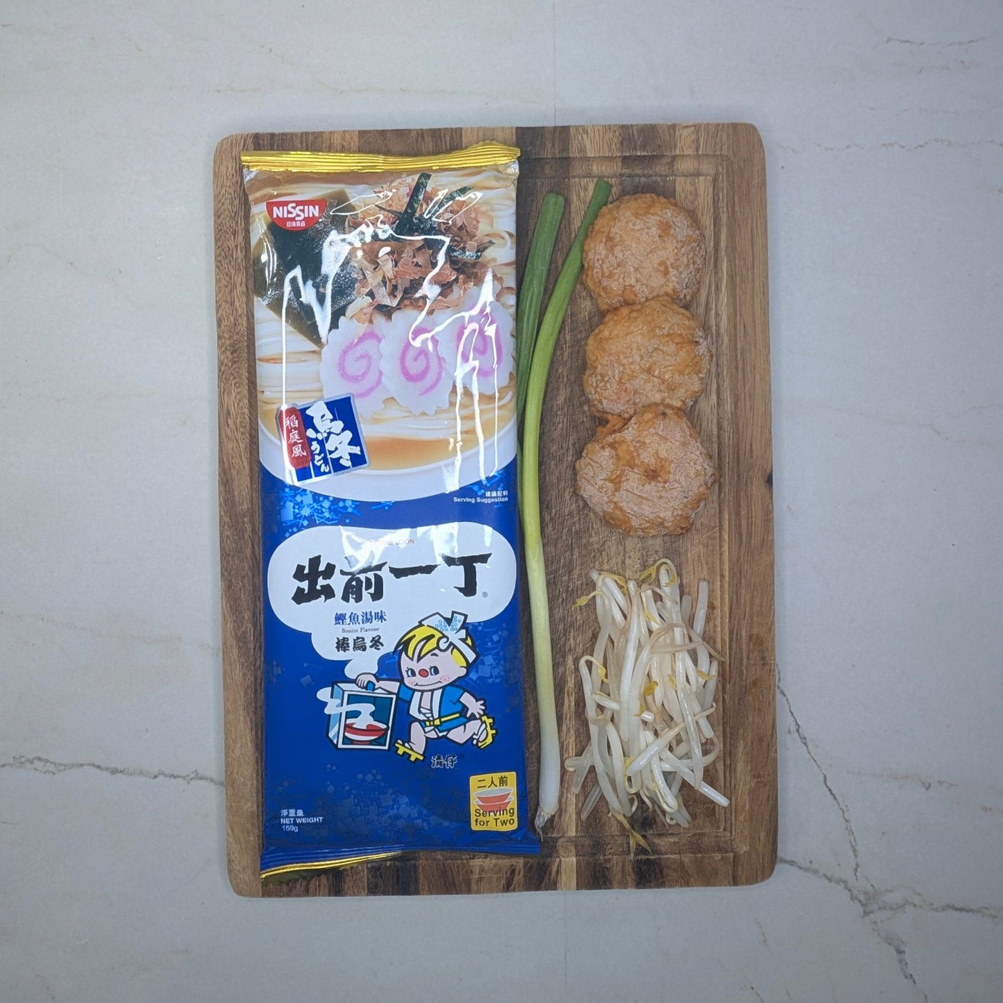 Bonito Flavor with Japanese Fish Cake, Bean Sprout & Chopped Scallions
