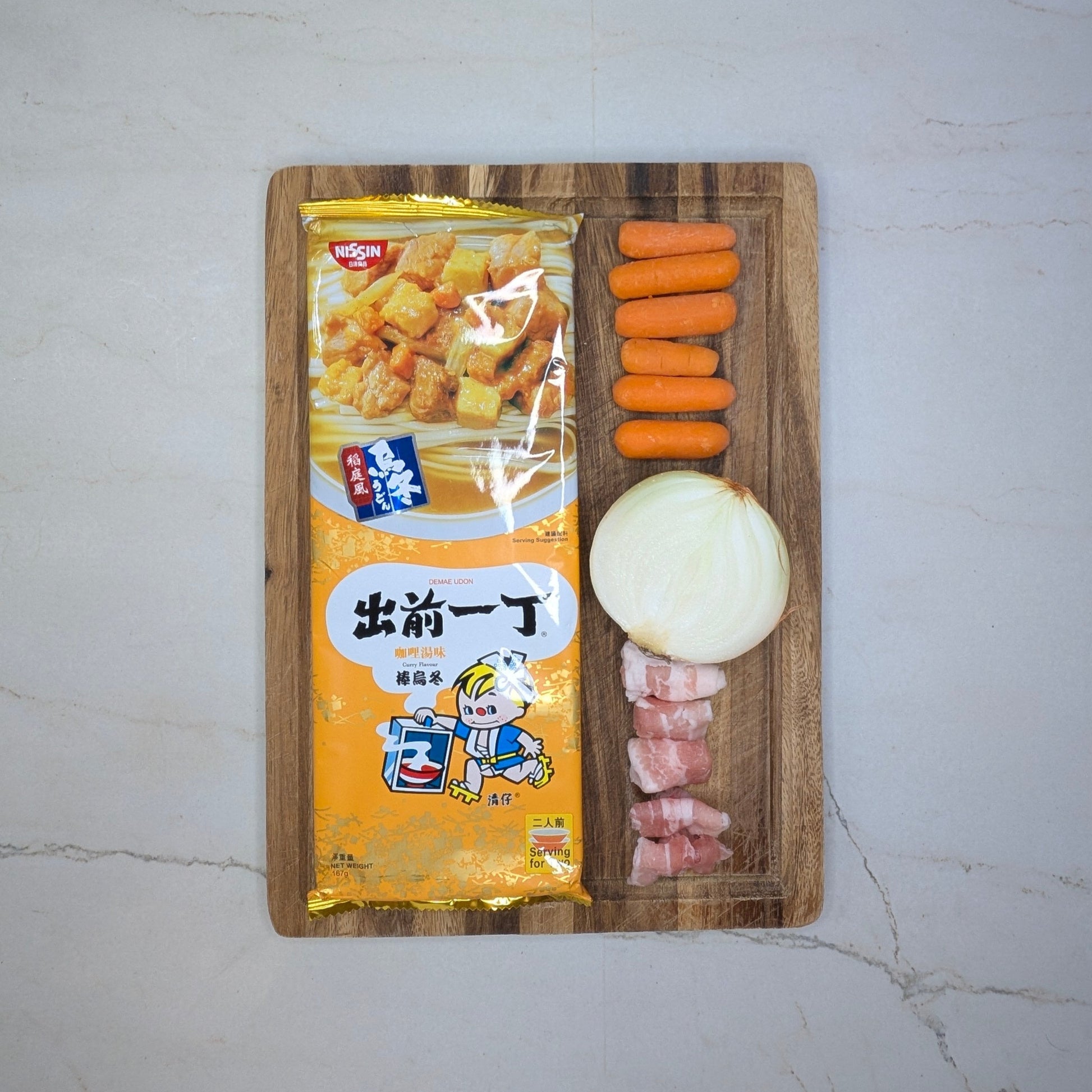 Curry Flavor with Pork Belly Slices, Baby Carrots & Onion Slices
