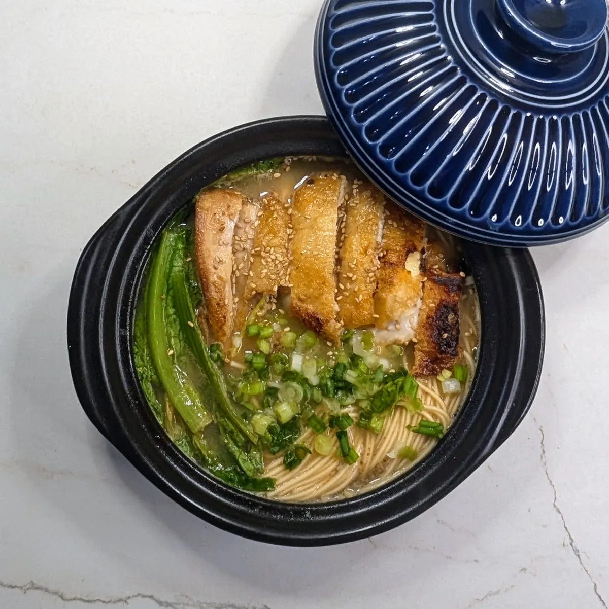 10-Minute One-Pot Black Garlic Tonkotsu Ramen with Crispy Chicken Thigh & A-Choy